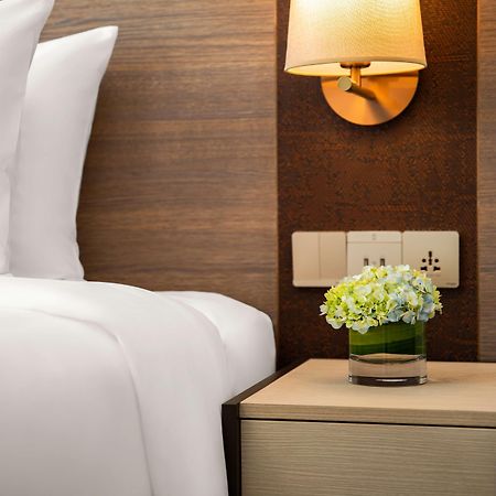 Radisson Mumbai Andheri Midc Exterior photo A bedside table