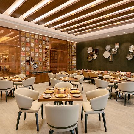 Radisson Mumbai Andheri Midc Exterior photo The interior of the restaurant