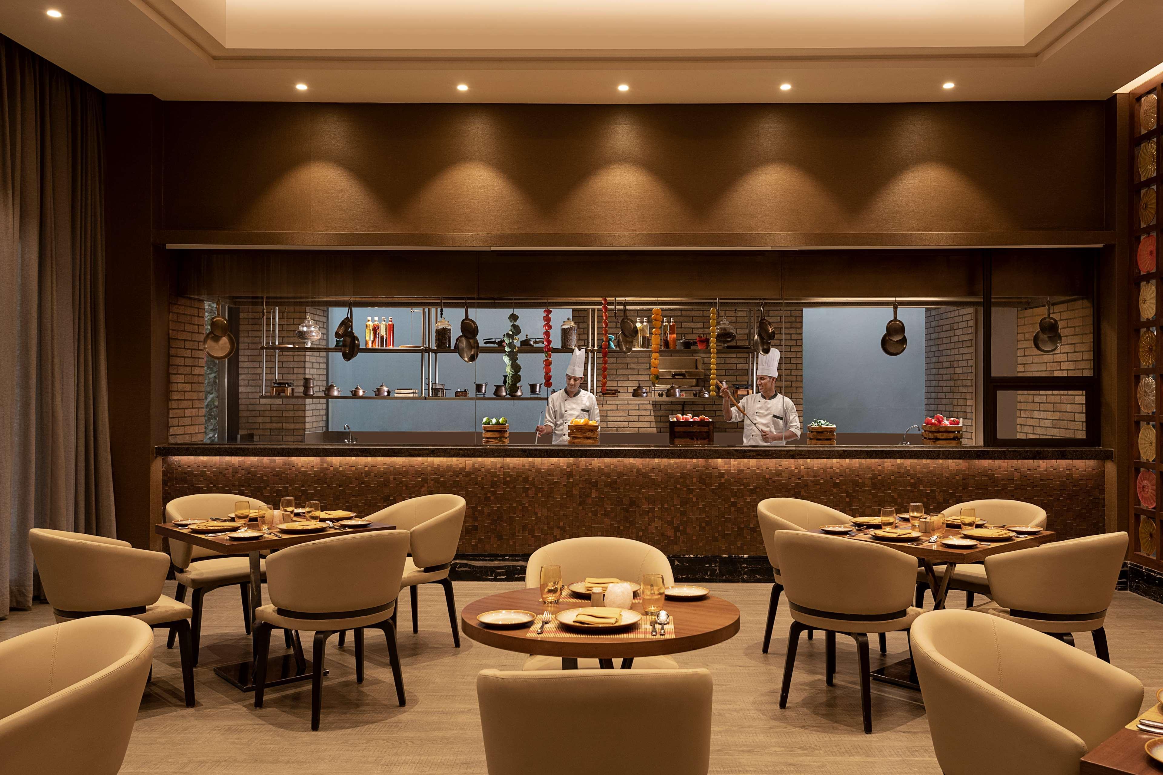 Radisson Mumbai Andheri Midc Exterior photo The restaurant's interior