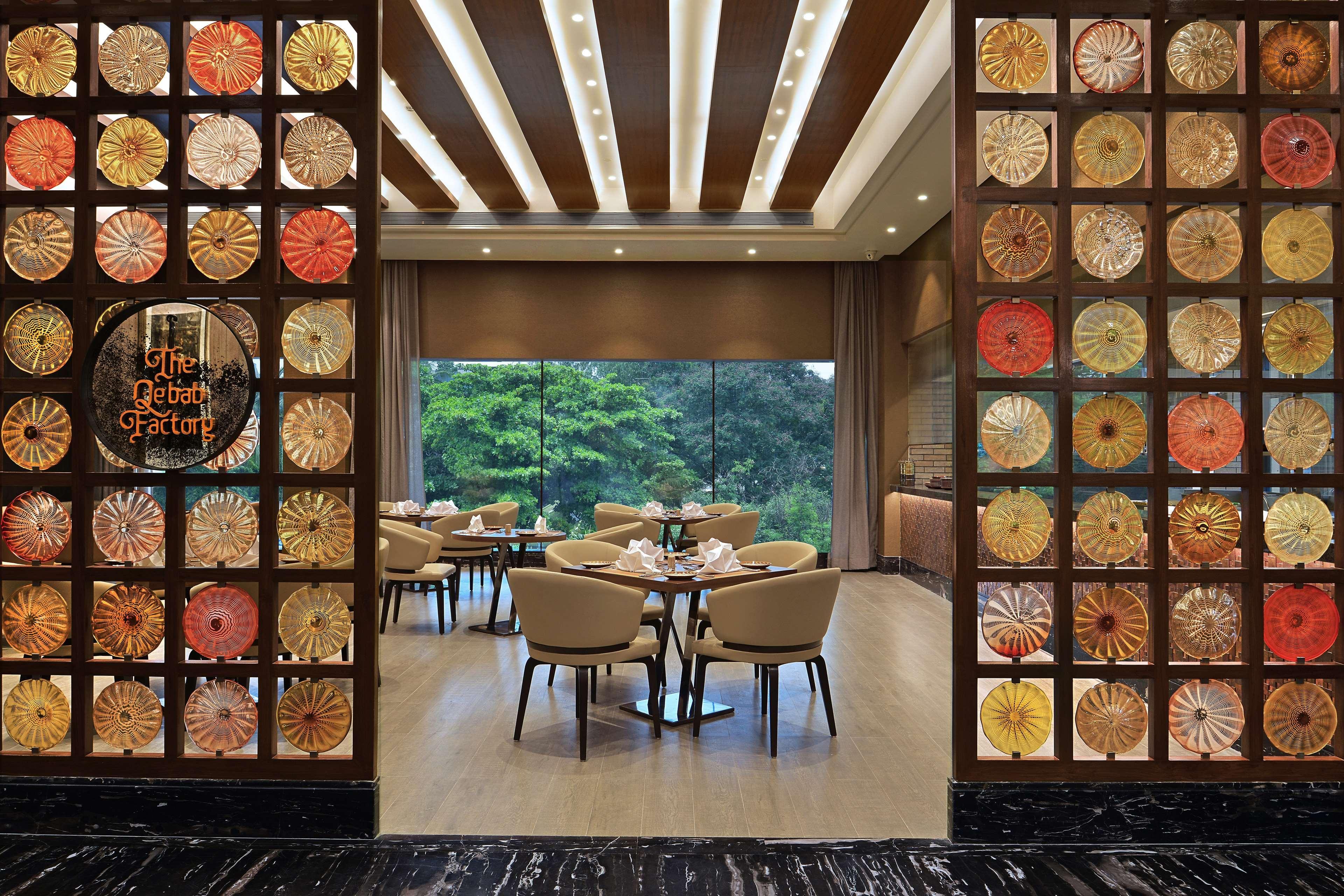 Radisson Mumbai Andheri Midc Exterior photo The Good Story